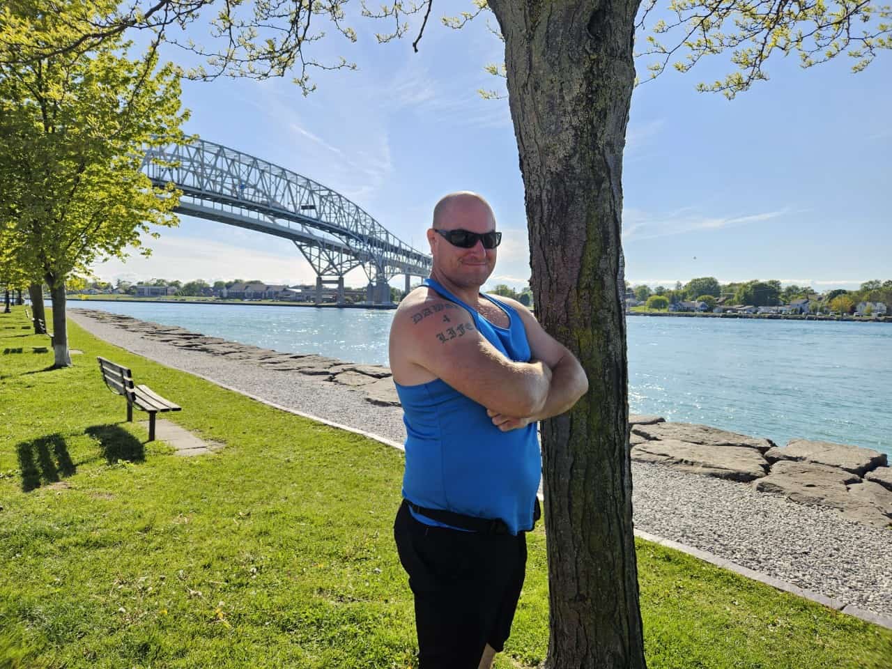 Brad by the Blue Water Bridge  - Point Edward Ontario Canada  - The original 1938 (north) Blue Water Bridge carries traffic westward into the USA while the 1997 (south) twined span carries eastbound traffic into Canada.
Point Edward Ontario Canada 