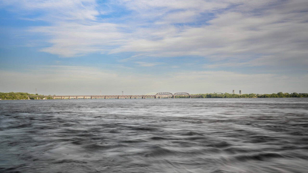 St-Lawrence-Sea-Way - If you look out toward the east from the park’s edge, you get an incredible view of the Honoré Mercier Bridge stretching across the water. Watching the massive cargo ships navigate the St. Lawrence Seaway right underneath its monumental steel arches really puts the scale of the river into perspective."
