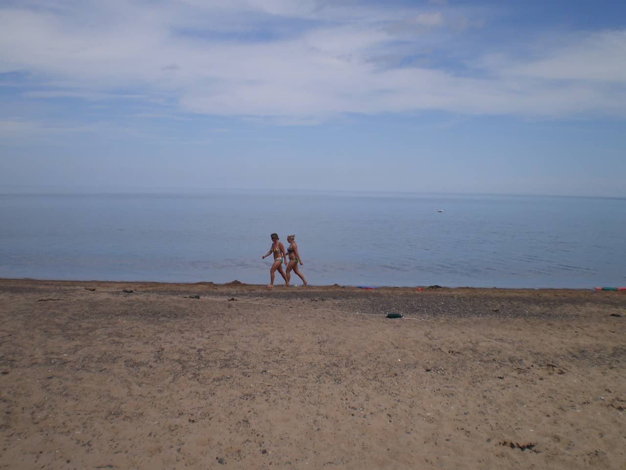 Melmerby Beach Walk - People walking the 2 km long Melmerby Beach on Little Harbour in Nova Scotia, Canada. 
