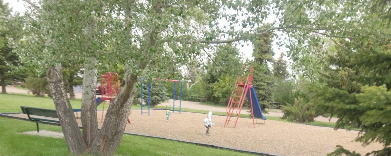 Playground at Cavan Lake Alberta  - Even the little ones will find something to do here! An older style playground is available in the Cavan Lake Recreation area