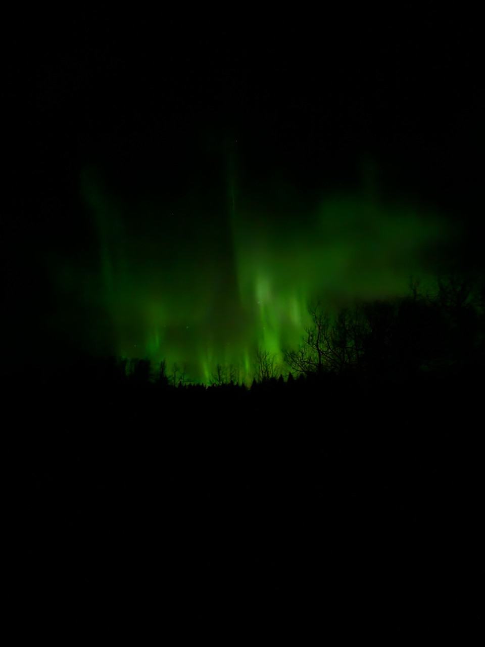 Phone Settings Matter for Northern Lights Photos - Playing around with the settings on your cellphone can help you capture the Northern Lights in different ways. This is just on basic settings. Doesn't have a chance to capture all of the lights moving to brighten everything up.